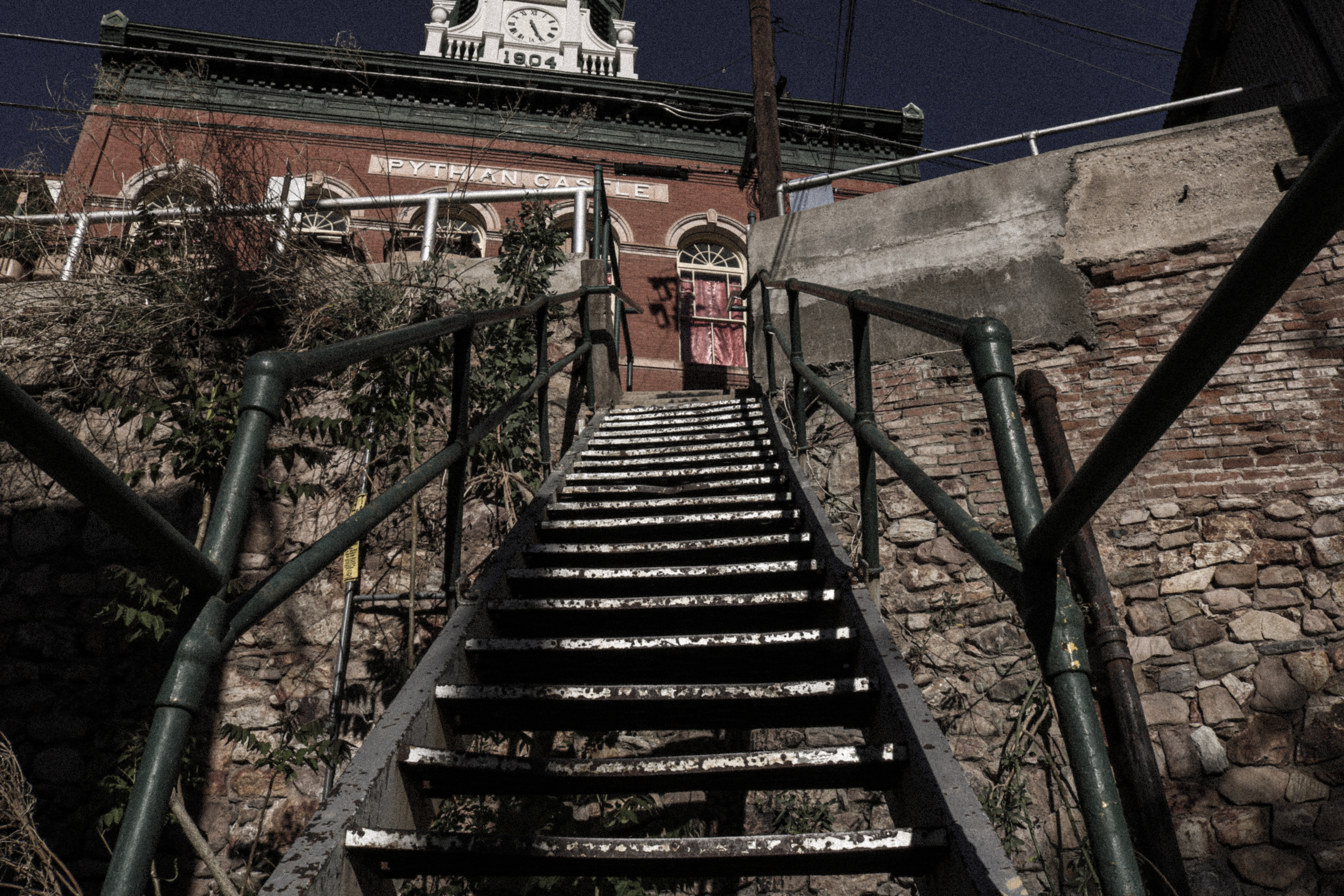 Stairway in Old Bisbee shot from low perspective.